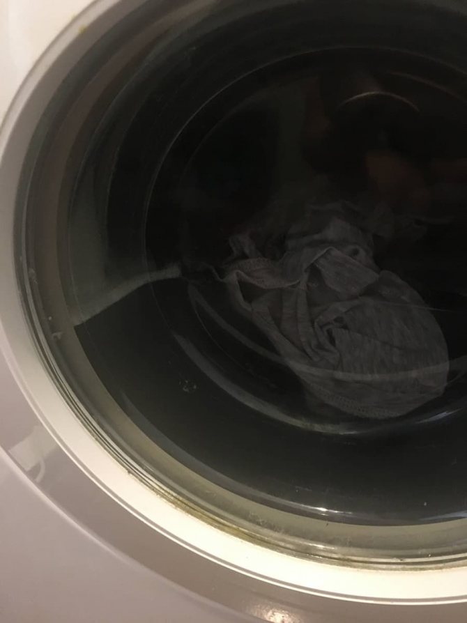 The washing machine fills with water
