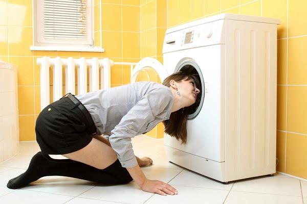 Girl with a washing machine