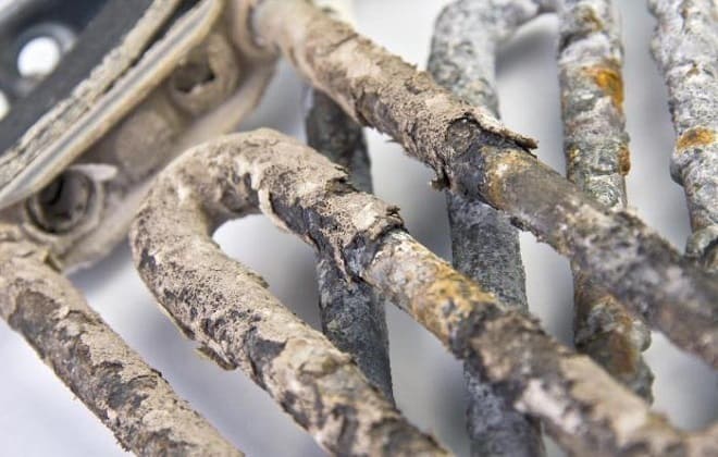 Limescale deposits on the heating element of the washing machine