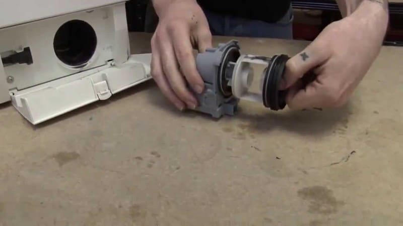 How to unscrew the filter in a washing machine