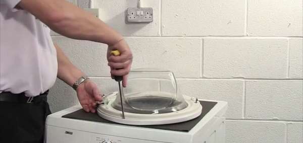 How to repair a washing machine door