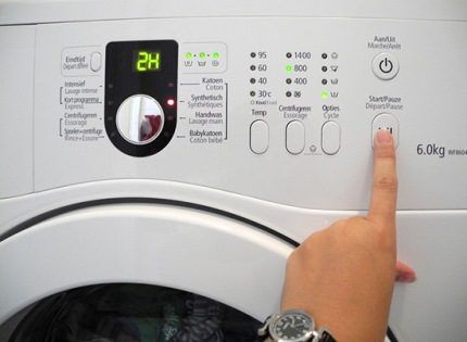 Washing start button in the device