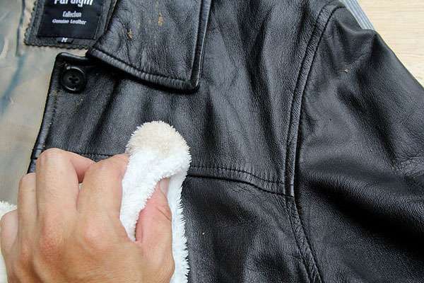 Removing paint from a leather jacket.