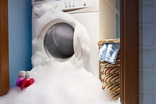 Foam comes out of the washing machine