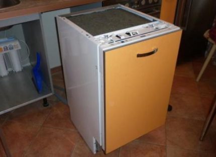 Dishwasher pulled out of cabinet