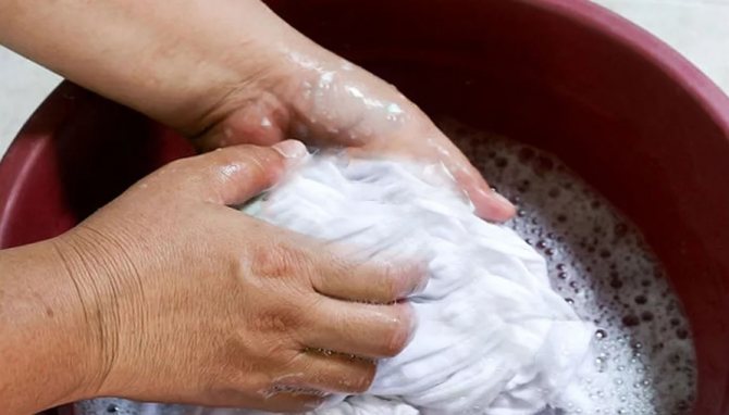 hand washing white shirt
