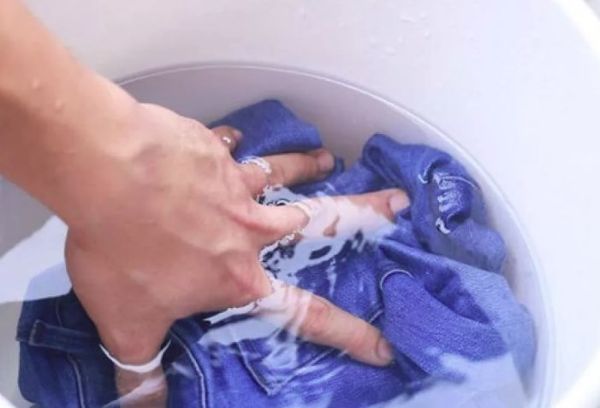Hand washing jeans