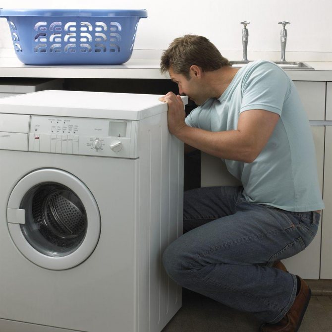 Remove the shipping bolts from the back of the washing machine