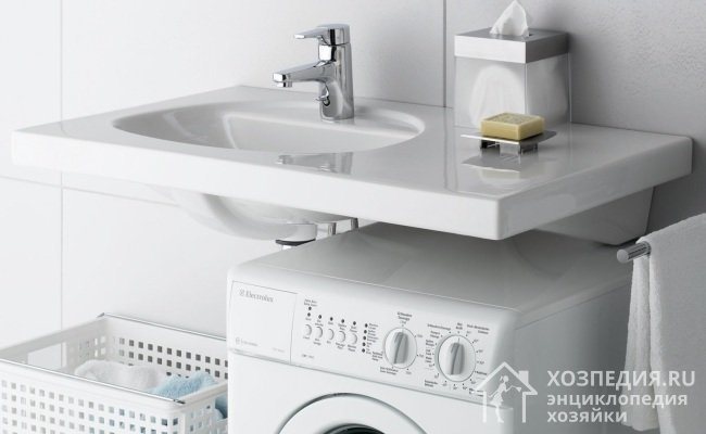 Electrolux brand washing machine 50 cm wide, placed under the sink