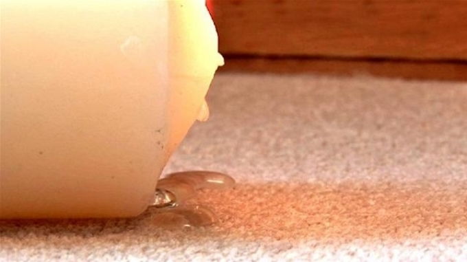 Candle on the carpet