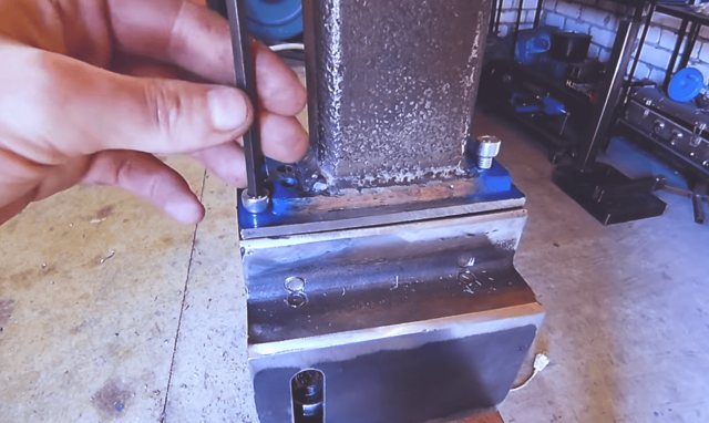 Do-it-yourself drilling machine with a washing machine motor