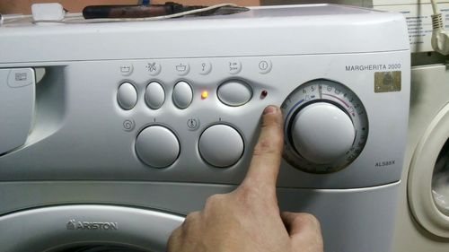 Turning on the washing machine